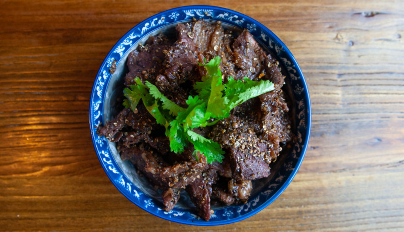 Nua pad luk phak chee, a stir-fried beef dish with coriander seeds, dates to the Thai royals' brief migration to Indonesia in the 1920s. // Photo: Kae Lani Palmisano