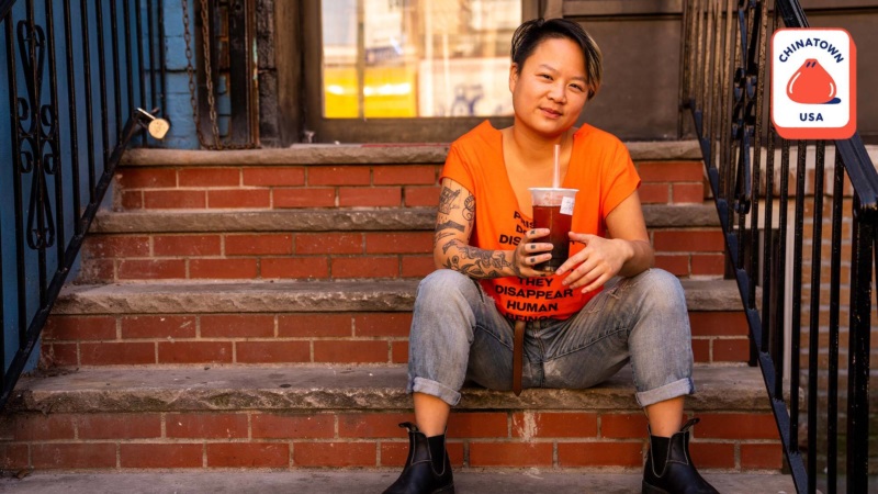 Stephanie H. Shih, an artist based in Brooklyn, in front of her favorite bubble tea spot in Sunset Park’s Chinatown. // Photo by Mike Grippi for Resy
