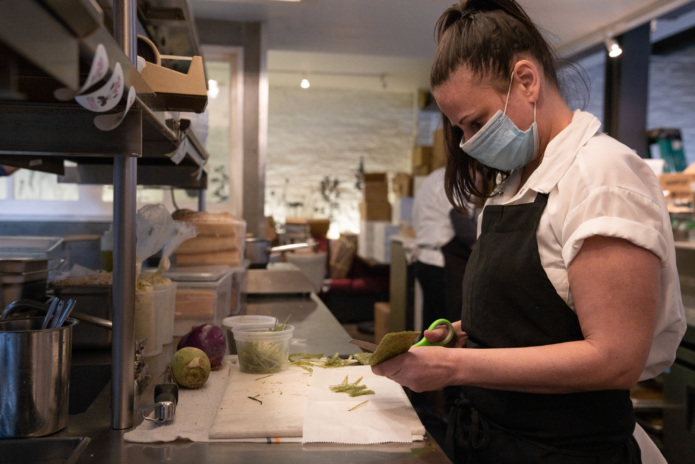 Cohen works in the restaurant's kitchen. "We are on the cusp of losing an entire generation of chefs," she says of the pandemic. // Photo by Mike Grippi for Resy