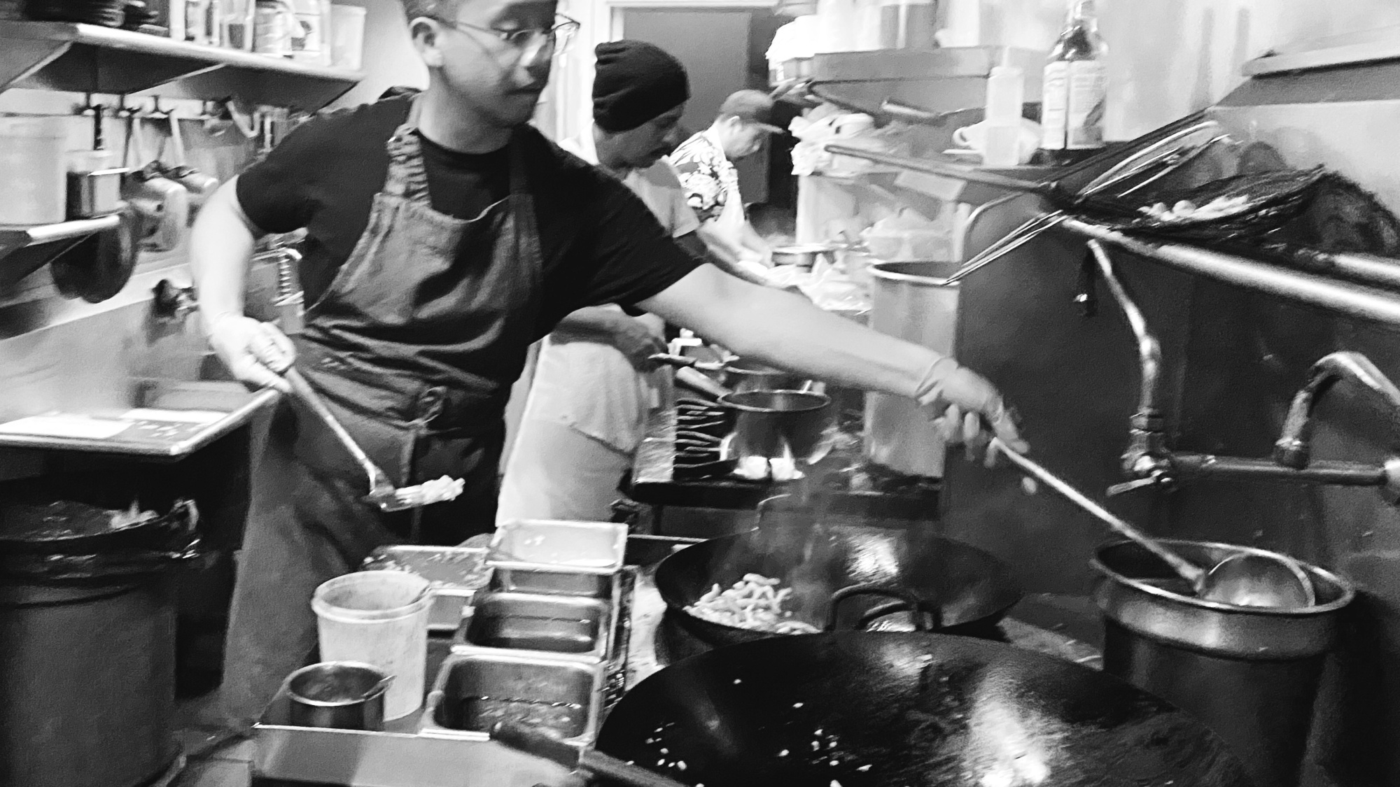 "The cuisine is never static in Thailand, especially as compared to here. It’s at 100 miles an hour and never the same." Justin Pichetrungsi cooking in Anajak's kitchen. // Courtesy Anajak Thai