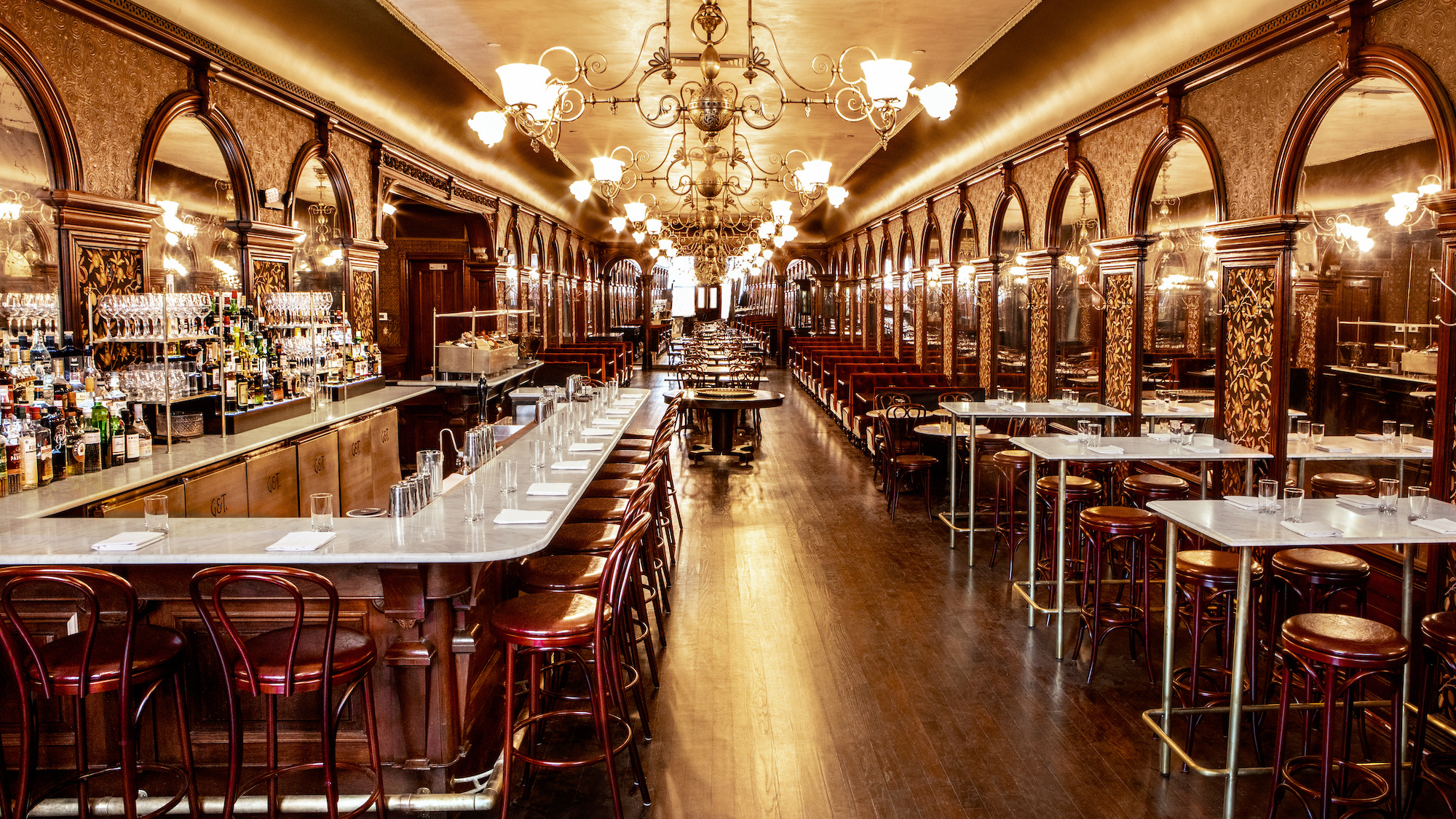 The current-day Gage & Tollner dining room. // Photo courtesy of Gage & Tollner; historical photos courtesy of the Brooklyn Historical Society