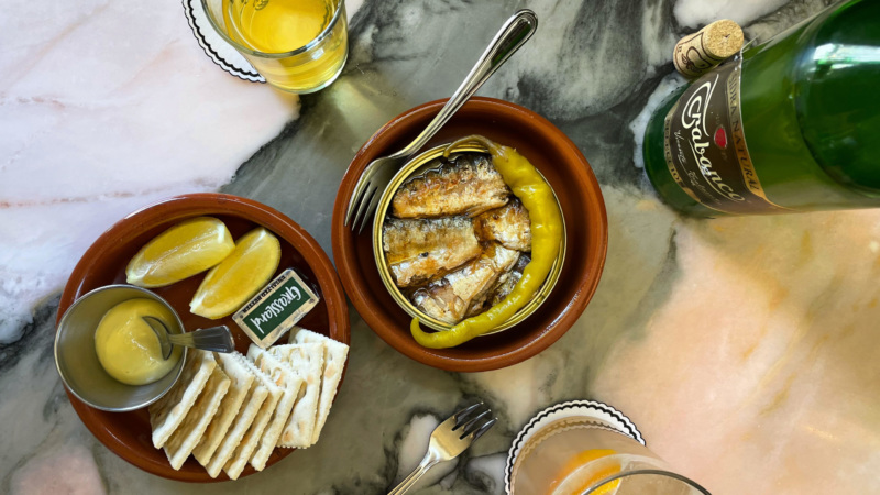 Grilled Sardines Escabeche from El Pinguino, shown with cider