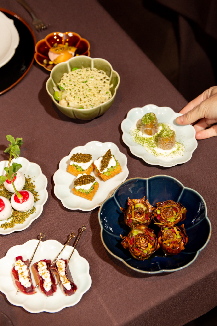 A spread of dishes at Al Coro in New York.