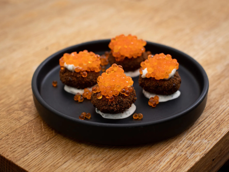 Smoked trout and potato croquettes, breaded in Runner Up's own dark rye, served with herb crème fraîche and trout roe.