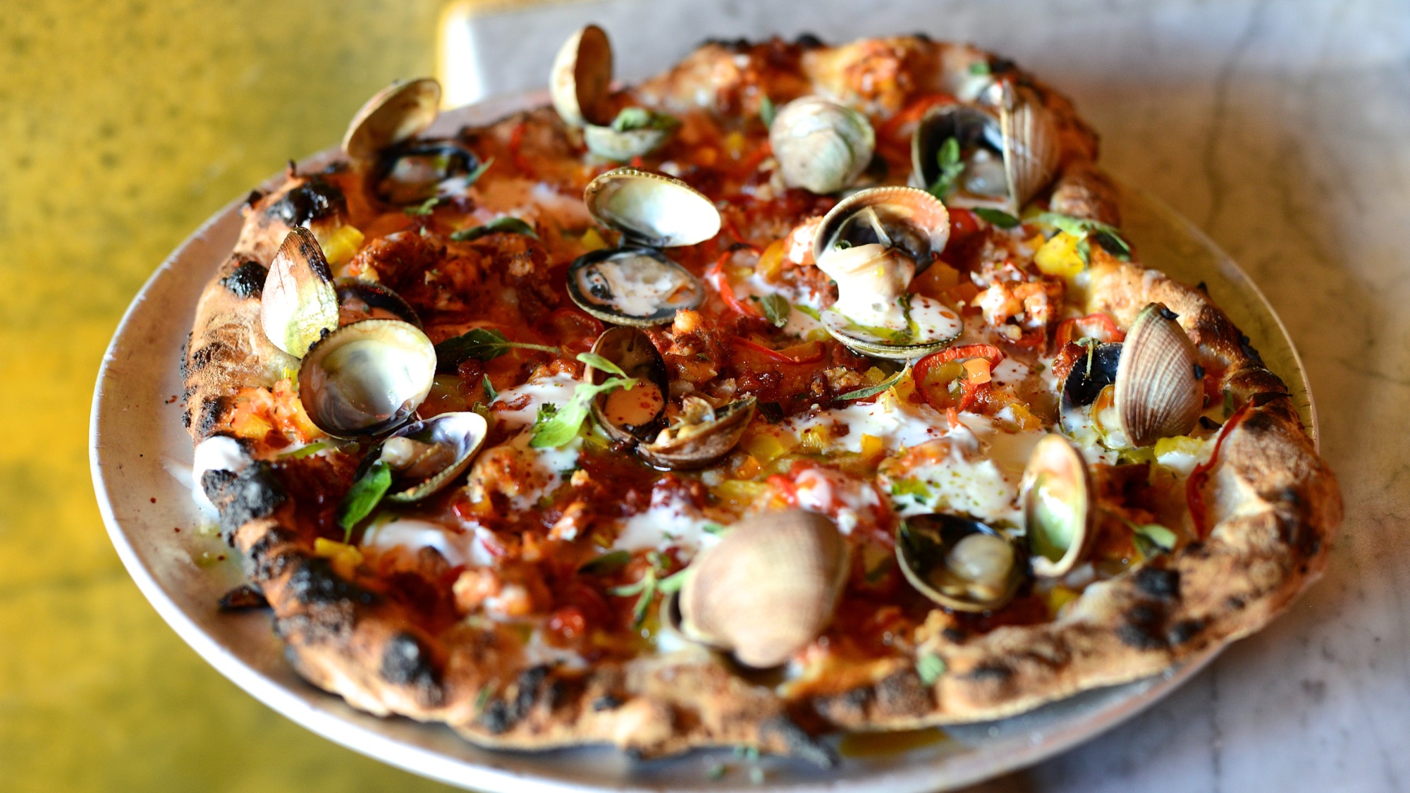 A clam pizza from Ogliastro Pizza Bar