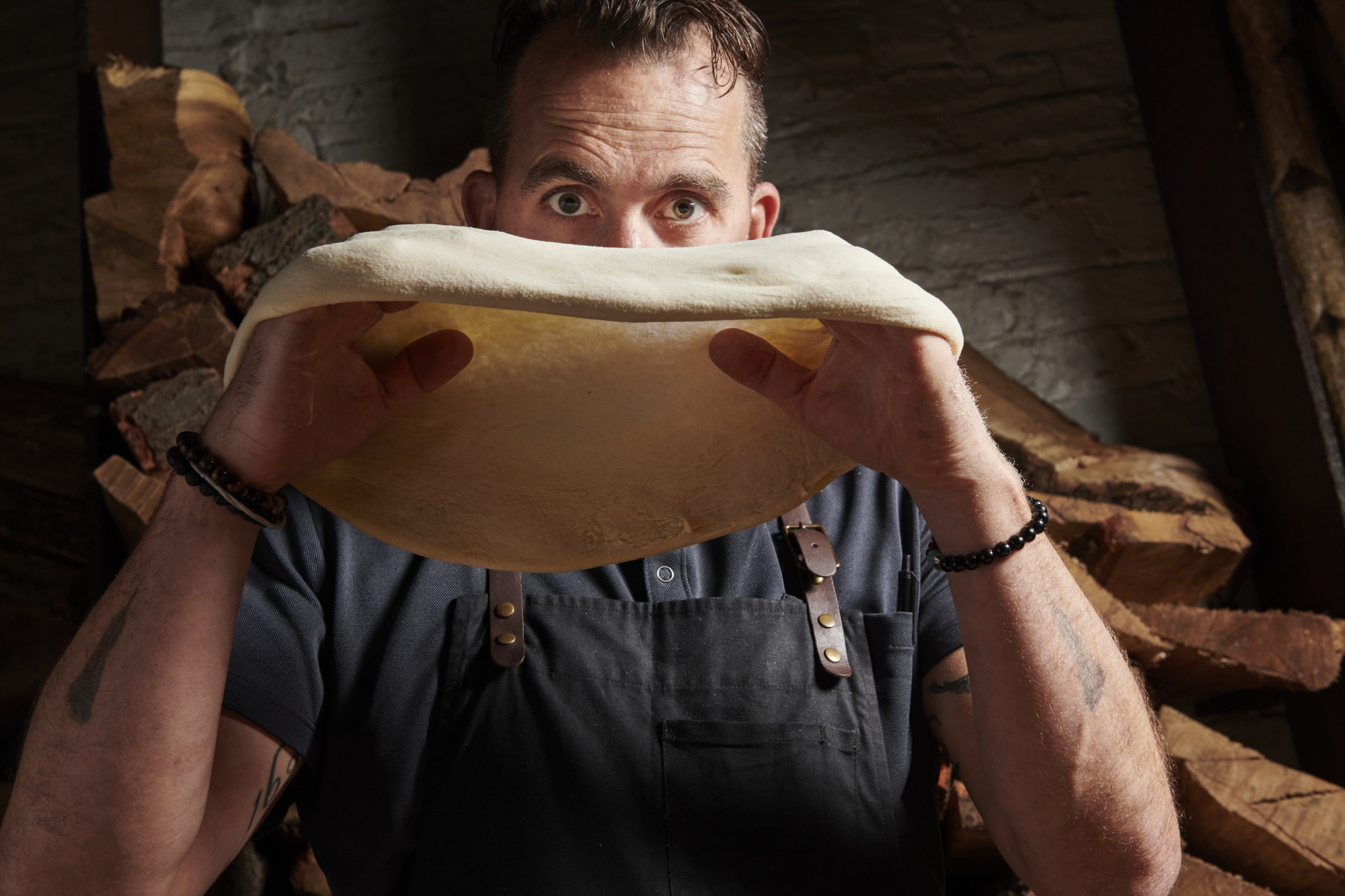 Marc Forgione with pinsa dough