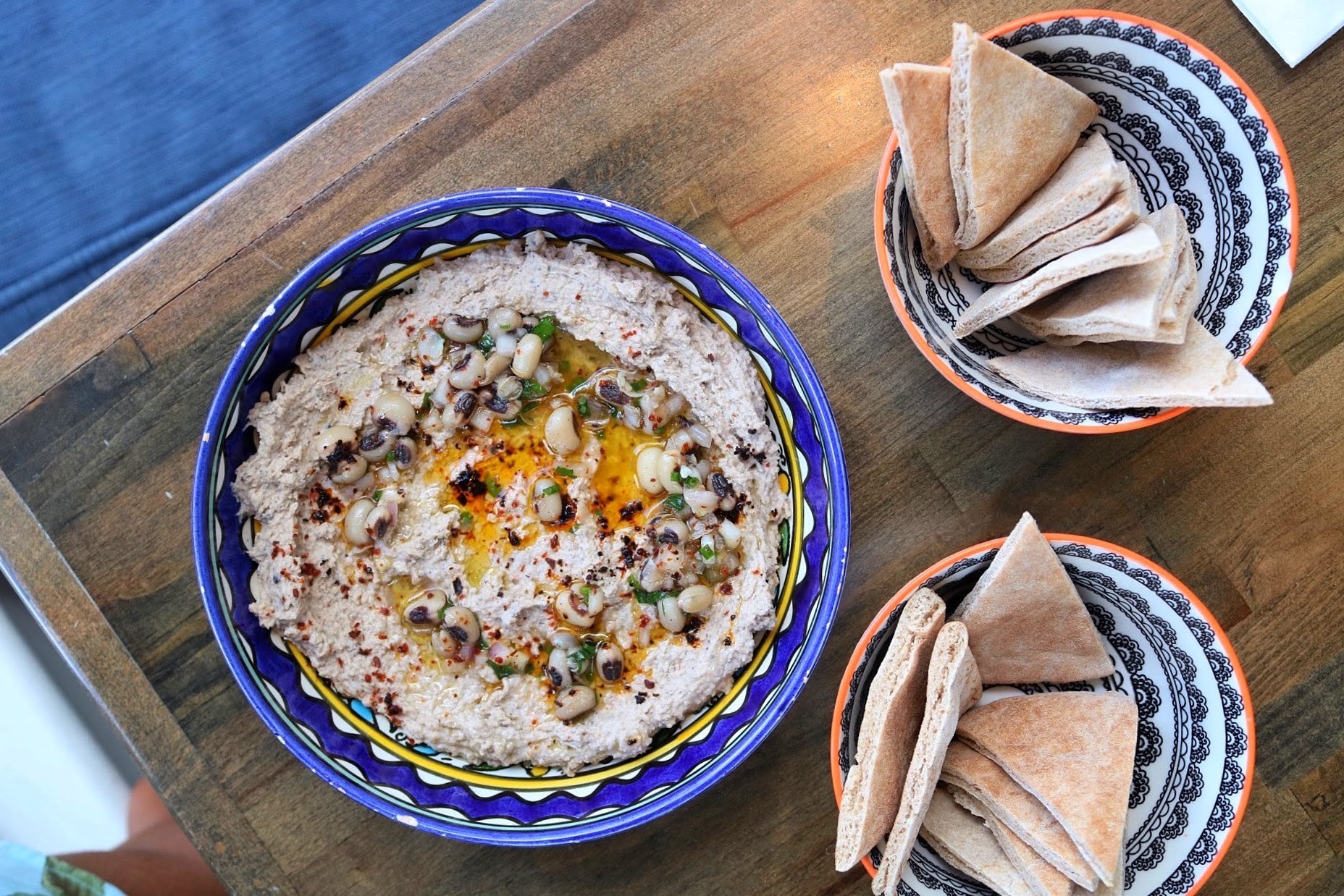 The hummus from Emma's Torch features black-eyed peas, inspired by flavors from the American South.