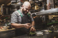 Chef Cosme Aguilar inside the kitchen of his restaurant, Casa Enrique