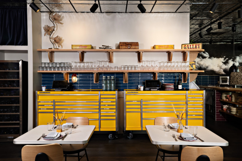 The bright yellow cabinets in the Walrus Rodeo dining room.