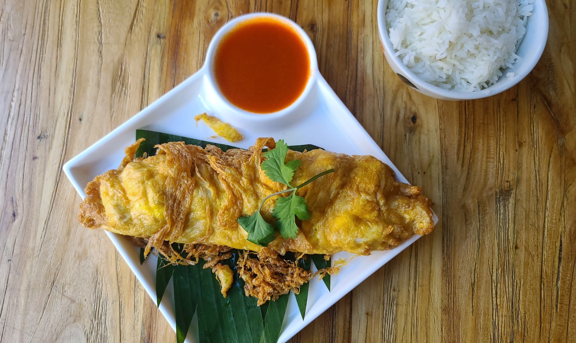 Kai jeow poo, a Thai street food classic and a best seller during Zaab Zaab Talay's new brunch service.