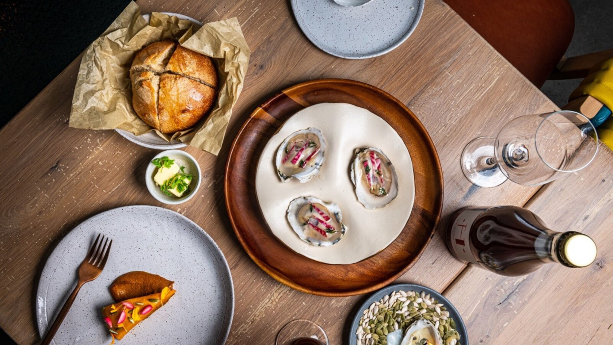 A spread of dishes at Oyster Oyster.