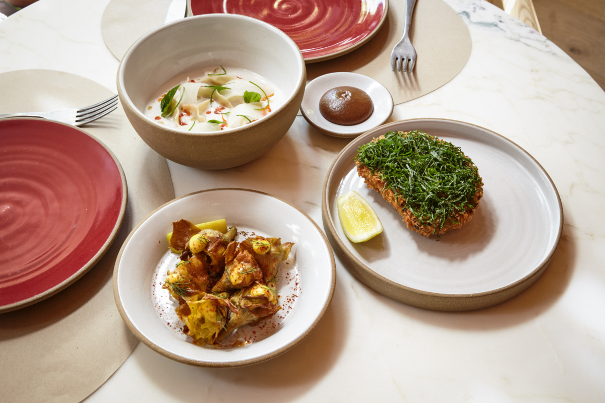 A Resy Guide to the Tin Building — Resy Right This Way