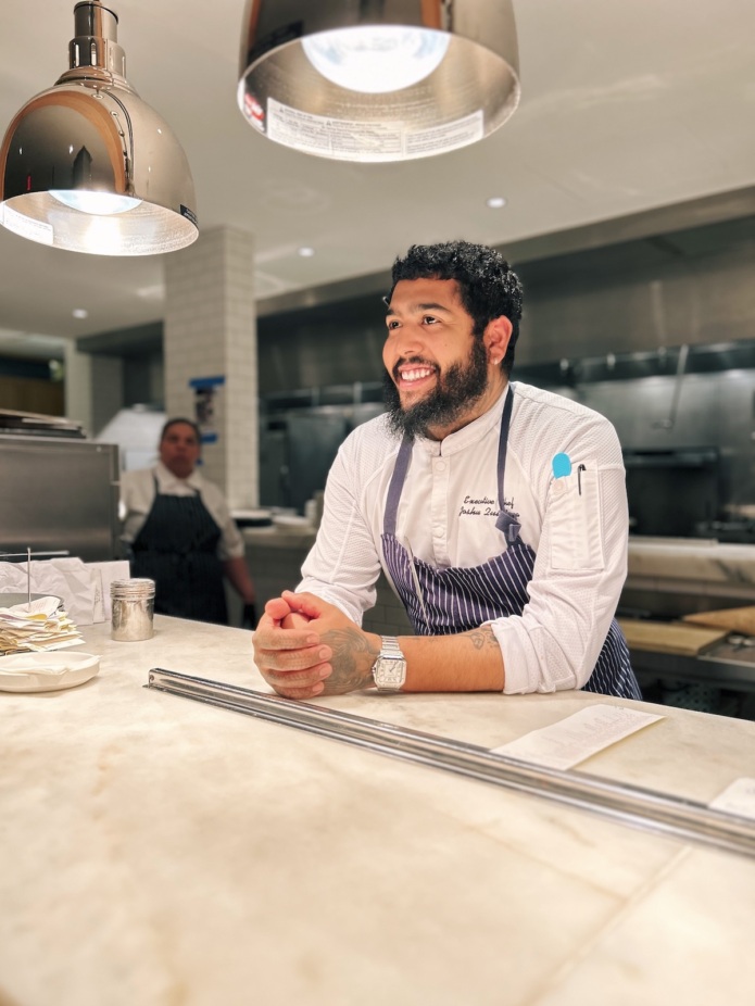 Joshua Quintana, Executive Chef, CO-OP Restaurant and Lounge in Philadelphia, in the kitchen.