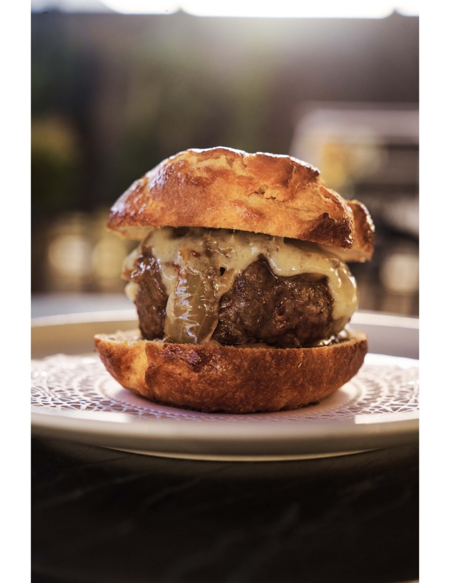French onion-style burger at Le Champ