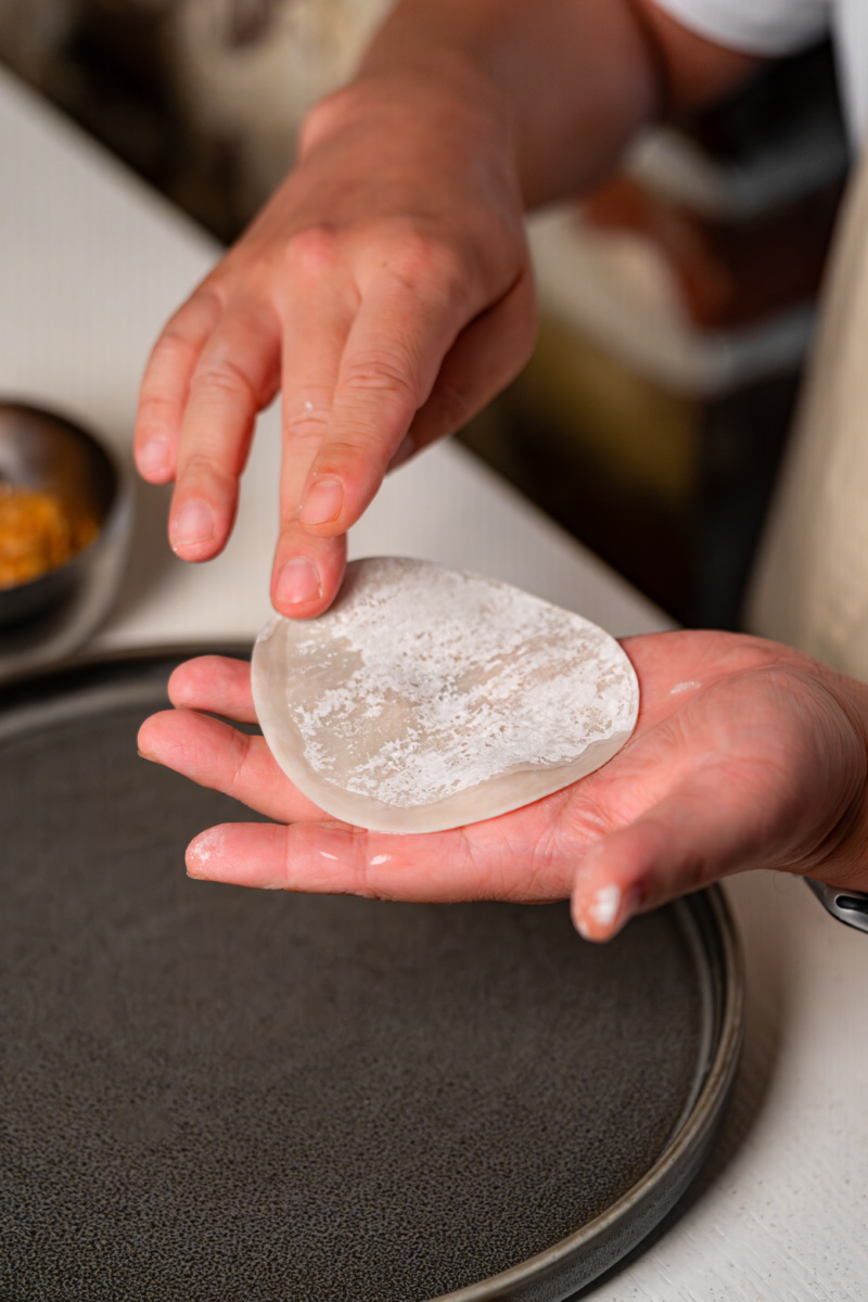 Danny Lee prepares Anju's mandu