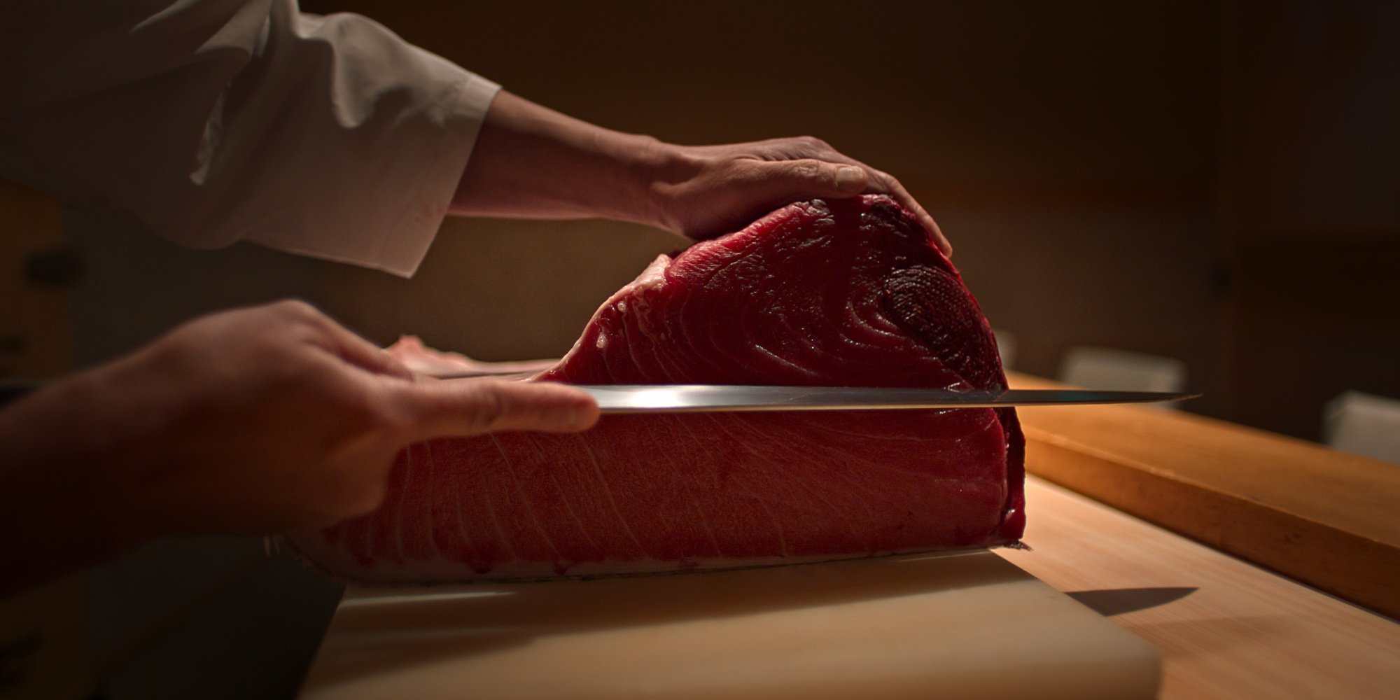 Tuna being prepared for sushi in “Omnivore”