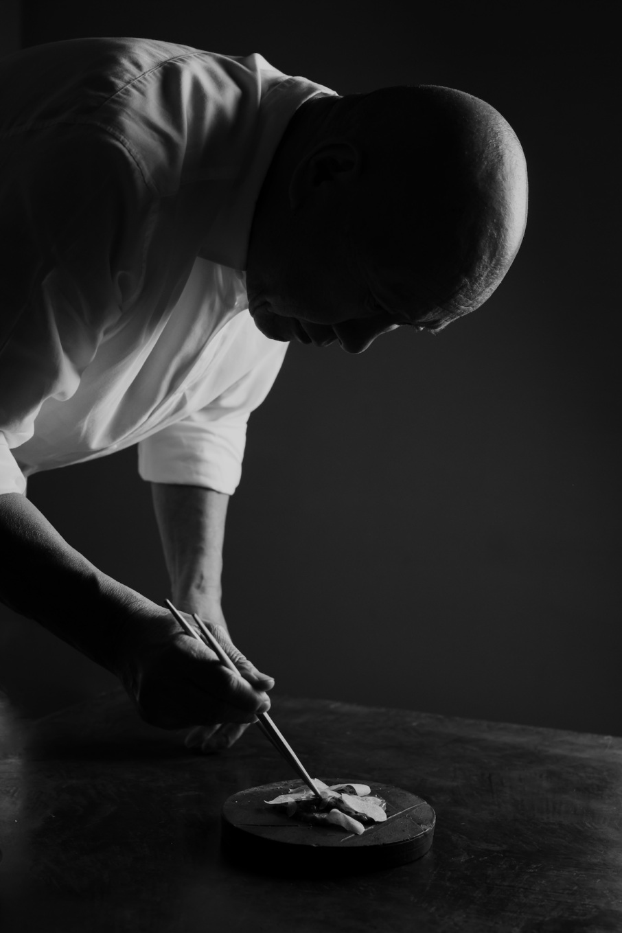 Chef Masayoshi Takayama prepares A5 Ohmi beef tataki with truffles
