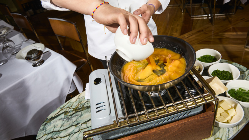 Making the tableside omelet at The Golden Swan