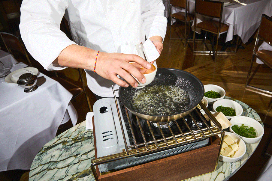 Making the tableside omelet at The Golden Swan