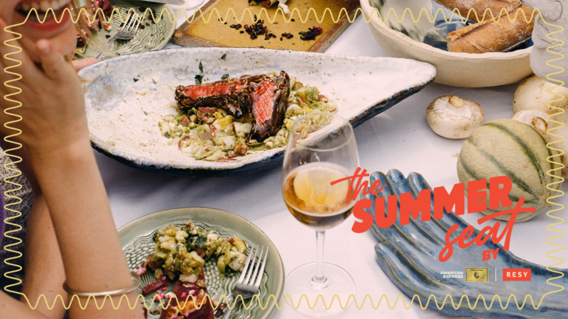 Photograph of a tablescape and a diner's arm with a logo to the right reading "The Summer Seat"