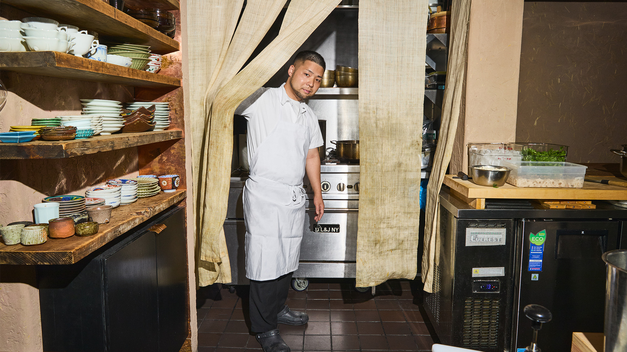 Koji Toyoda in his tiny kitchen at Odo East Village