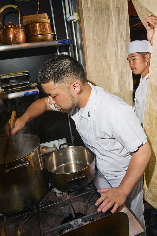 Koji Toyoda in his tiny kitchen at Odo East Village